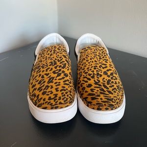 Nike Women’s Slide Leopard print running shoe size 9.5